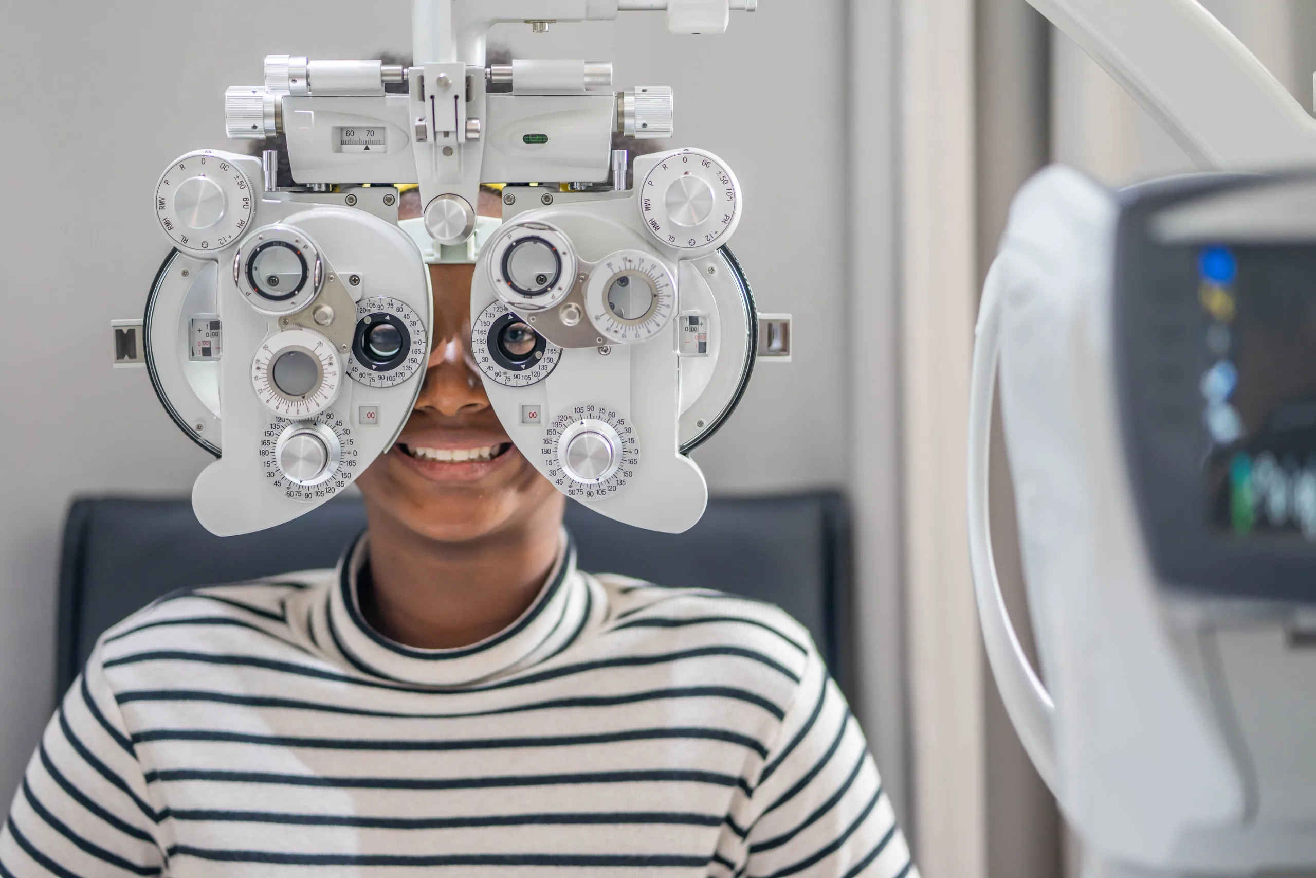 Young man gets an eye exam 