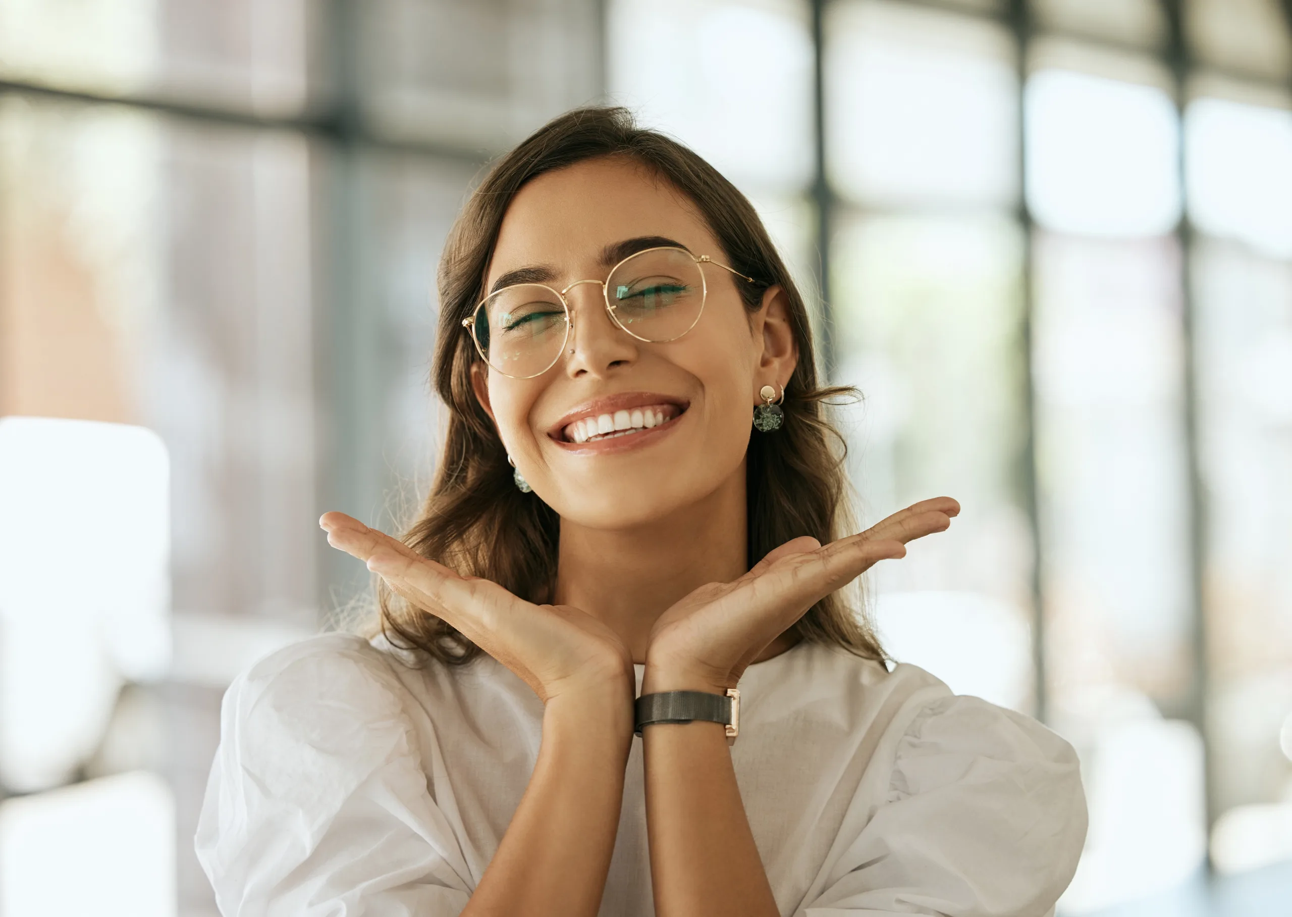 Adult women radiant about her glasses and vision
